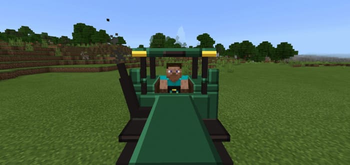 Player rides in a tractor