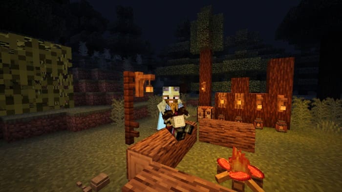 Player sitting on a log