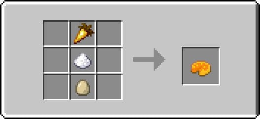 Crafting a pie with golden carrots in Minecraft