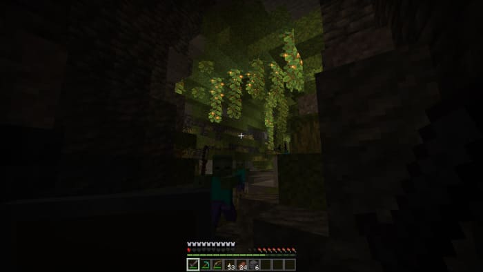 Zombies in a dark lush cave