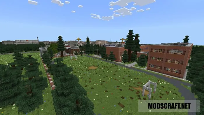 Forest, fields, and city houses