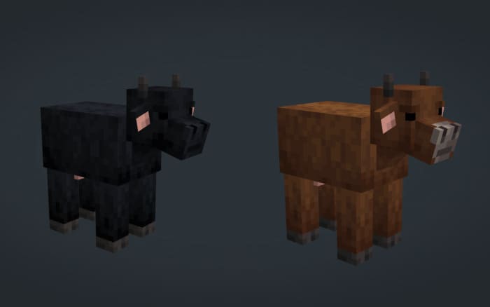 Черная и коричневая корова