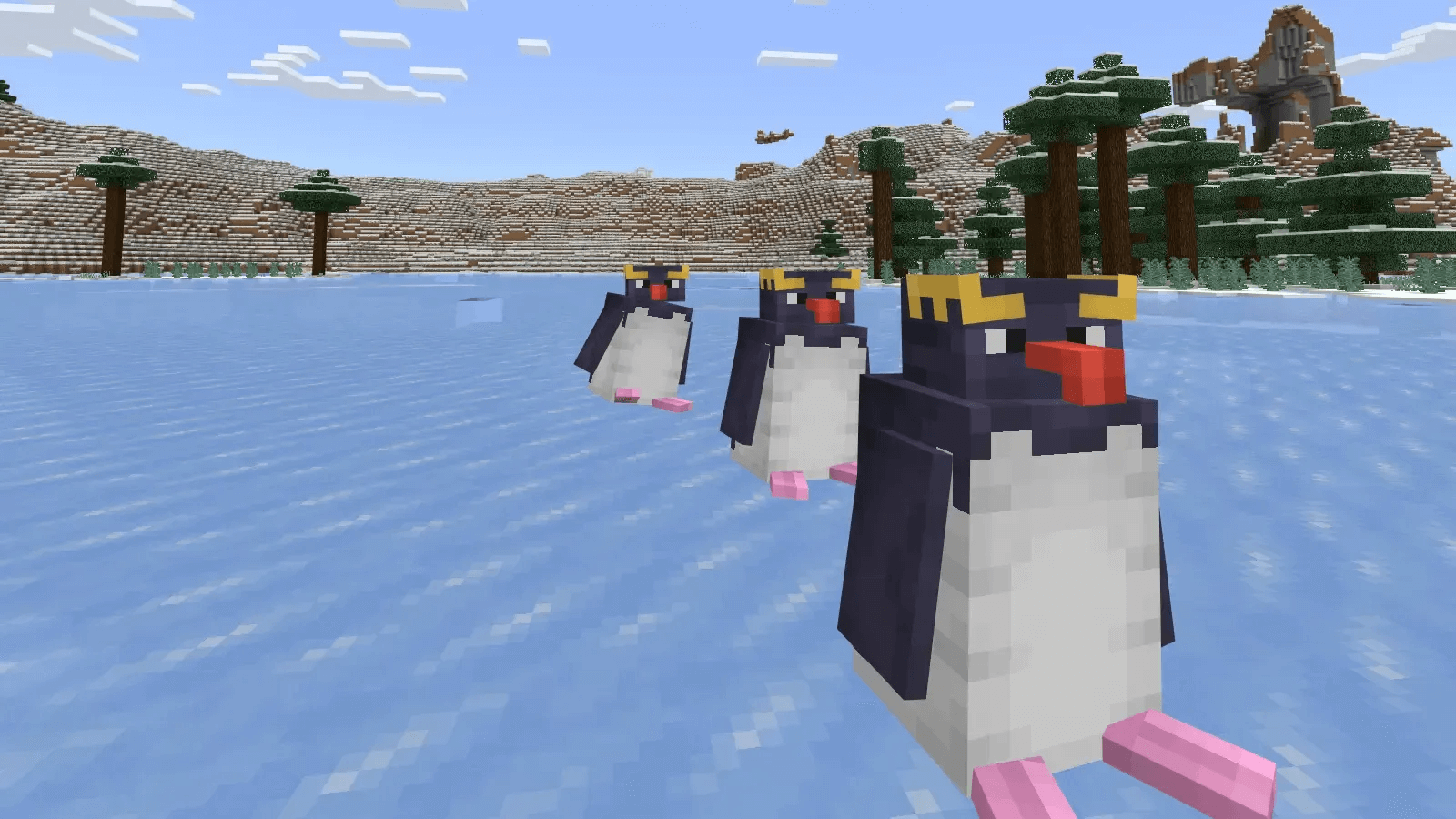 Пингвины идут по льду