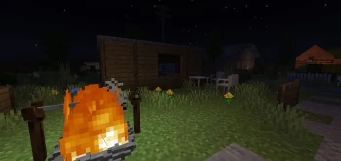 A bonfire and a survivors' quarters