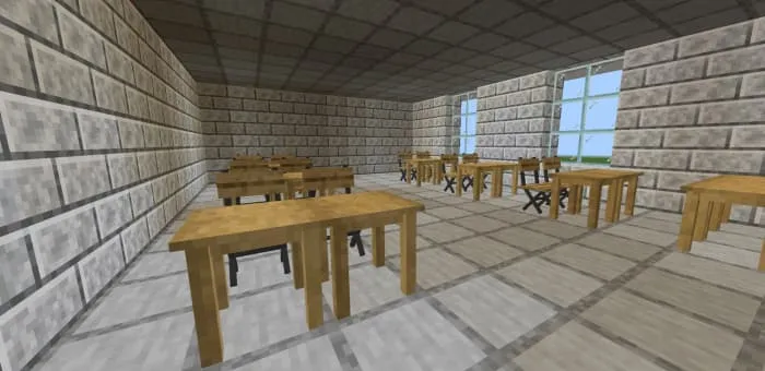 A classroom with tables for students